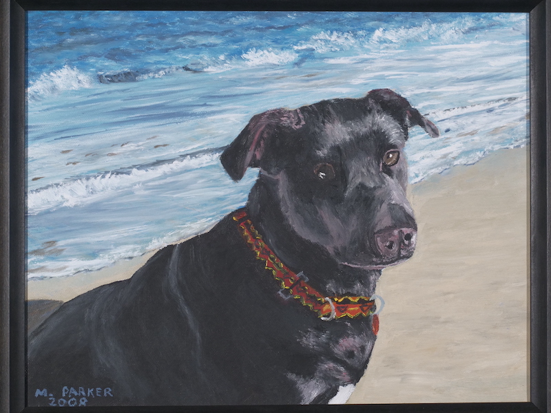 Painting of a black lab on a beach